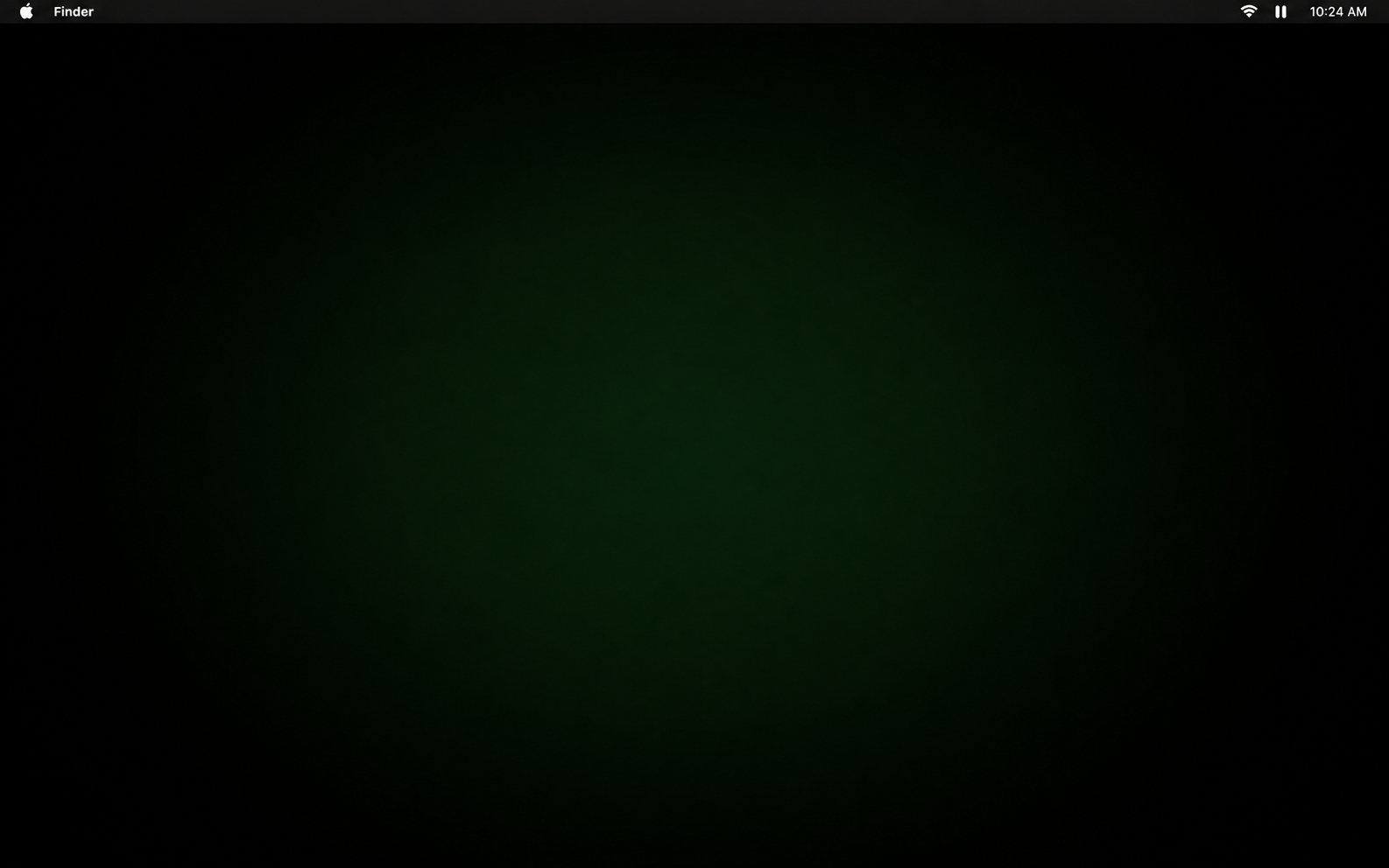 macOS desktop in Stage Mode — clean, no icons, green StageClear dot in menu bar